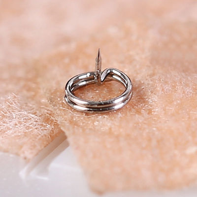 กดและปล่อยเข็มจุดฝังเข็มเดี่ยวเพื่อการรักษาที่มีประสิทธิภาพ